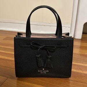 Black Kate Spade purse with crossbody strap
